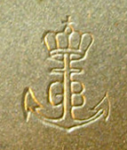 Gustav Becker Movement Logo from a Lantern Clock - Antique Clocks Guy