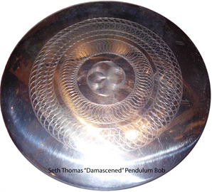 Seth Thomas Damascened Pendulum Bob - Antique Clocks Guy