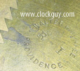 Stamp on back of moon dial - Antique Clocks Guy