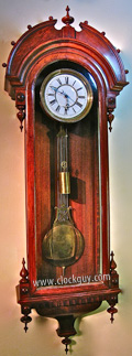 George A. Jones Regulator No. 6 in Black Walnut - 67" length, 8" dial with sweep seconds, vertical crown style pinwheel movement, maintaining power ~ Antique Clocks Guy