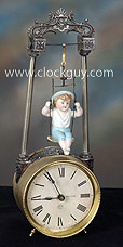 Ansonia Swinging Doll Clock - Antique Clocks Guy